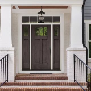 Front view of a front house, brown front door; Shutterstock ID 1134249083; Purchase Order: Last 21; Job: 02192020; Client/Licensee: TT
